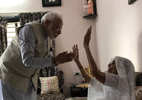 Prime Minister Narendra Modi meeting his mother at her residence in Gandhinagar on Tuesday. (ANI)