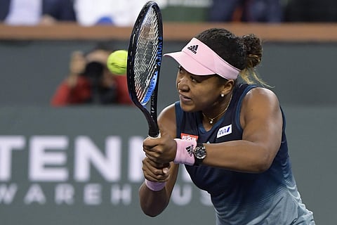 The win ensures she will hold on to top spot for at least another week. | AP