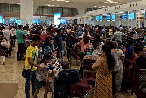 Passengers stranded in Mumbai Airport due to server issue of Air India. (Twitter | @mani_8612)