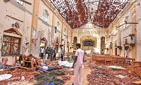 Dead bodies of victims lie inside damaged St. Sebastian’s Church in Negombo (Photo |PTI)