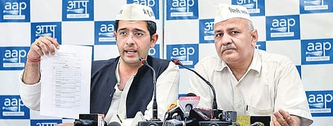 AAP’s Raghav Chadha with Deputy CM Manish Sisodia during a press conference in New Delhi on Saturday | Naveen kumar
