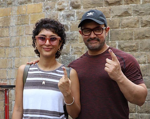 Aamir Khan with wife Kiran Rao after casting vote. (Photo | Twitter)