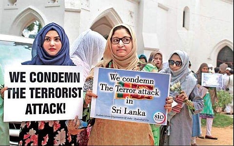 Islamic Jamaat students hold placards at St George’s Church to condemn the terror attacks across Sri Lanka, in Hyderabad on Sunday | Sathya Keerthi/EPS