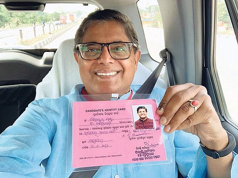 BJP’s candidate for Kendrapara Lok Sabha constituency Baijayant Panda on his way to a booth on Monday (Twitter| Chowkidar Baijayant Panda)