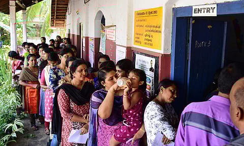 People wait in a long queue to cast their votes during 2019 Lok Sabha elections in Kerala. (Photo | Albin Mathew, EPS)