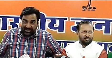 RLP Convener Hanuman Beniwal (L) with Union Minister Prakash Javadekar (Photo | Twitter)