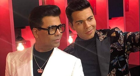 Karan Johar and his wax statue. (Photo | Twitter)
