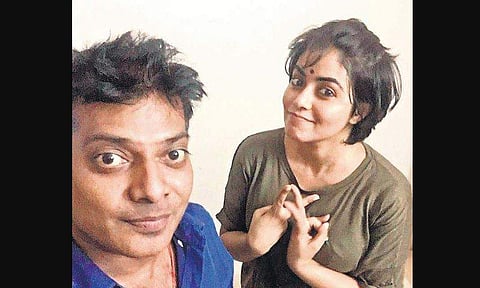Producer Nithin Sathyaa with actress Poorna