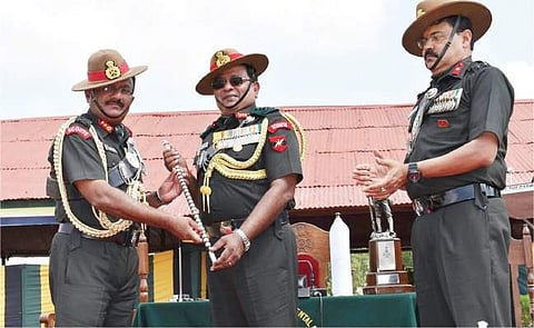 A file image of Lieutenant General Cherish Mathson (centre) taking over as Colonel of the Regiment from Lieutenant General Sarath Chand (left)