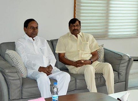 TRS chief K Chandrasekhar Rao with TDP leader Mandava Venkateshwara Rao on Friday (Photo | EPS)