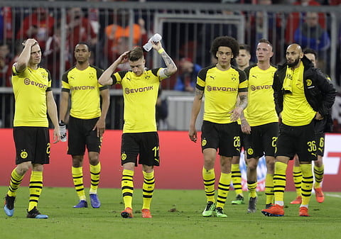 Bayern are only a point ahead of Dortmund with six games to go. | AP