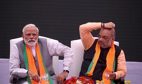 Prime Minister Narendra Modi and BJP President Amit Shah after the release of Bharatiya Janata Partys BJP manifesto Sankalp Patra for Lok Sabha elections 2019 in New Delhi. (Photo | Shekhar Yadav, EPS)