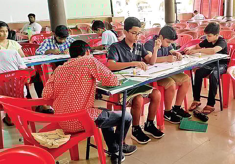 Students working on their models