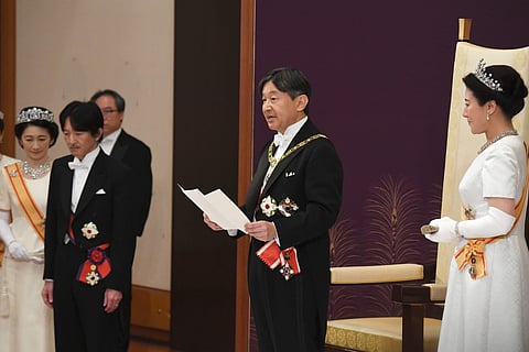 mperor Naruhito, accompanied by new Empress Masako, makes his first address during a ritual after succeeding his father Akihito at Imperial Palace in Tokyo (Photo|AP)