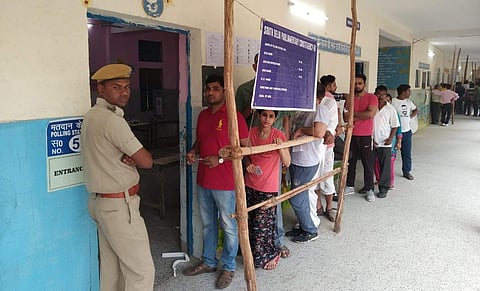 Voters waiting in queue to cast their votes at a polling station in New Delhi. (Photo| Shekhar Yadav/ EPS)