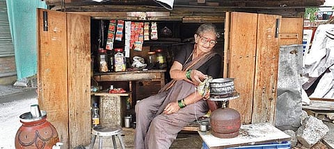 85-year-old Devaki in her shop at West of Chord Road in Manjunathnagar, Bengaluru on Saturday| NAGARAJA GADEKAL