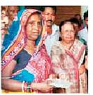 Screen grab of BJD candidate from Patkura, Sabitri Agrawalla distributing relief among Fani affected