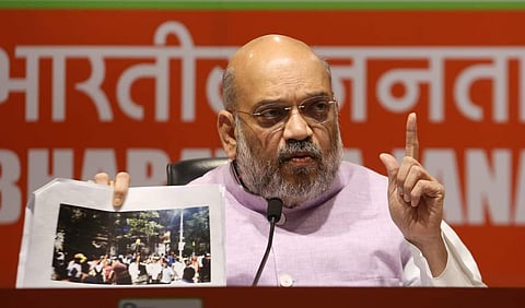 BJP president Amit Shah addresses a press conference at BJP HQ in New Delhi on Wednesday. | (Shekhar Yadav | EPS)