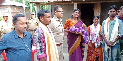 Hailakandi Deputy Commissioner (District Magistrate), Keerthi Jalli with Nandita and the newborn Shanti. (Photo | EPS)