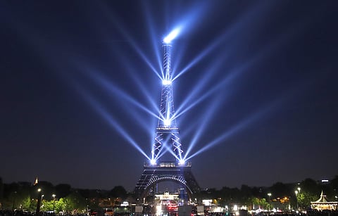 The Eiffel Tower has turned 130-years-old on Wednesday. Paris is celebrating its birthday with a light show at the famed monument. (Photo | AP)