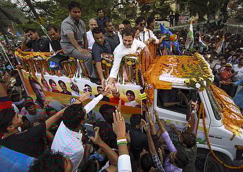 Congress President Rahul Gandhi with party candidate from Patna Sahib Shatrughan Sinha during a roadshow for the seventh and last phase of Lok Sabha polls in Patna | PTI