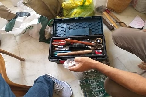 The police recovered one 9 mm pistol, 25 live cartridges, ULFA pads, bomb-making machines, 20 kg gun powder etc from the house