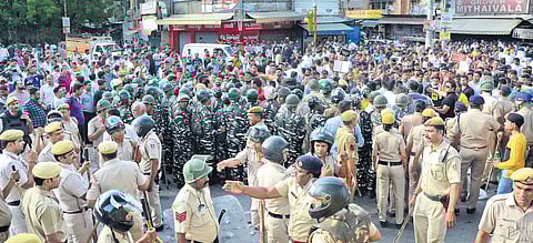 Police deployed in huge strength to thwart any untoward incident at Moti Nagar’s Basai Darapur village on 16 May 2019. (Photo | Naveen Kumar, EPS)