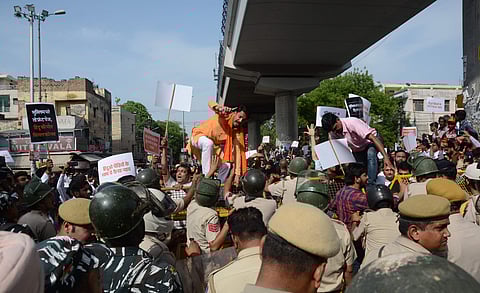 Members of Tyagi community protest businessman Dhruv Tyagi's murder at Basai Darapur village in Moti Nagar, New Delhi. (Photo | Naveen Kumar, EPS)