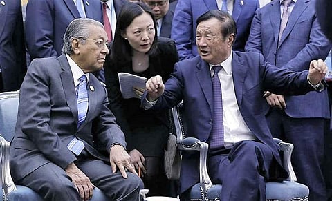 Huawei founder and CEO Ren Zhengfei (R) (File Photo | AP)