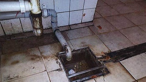A picture of an open drain inside the kitchen of the Curry Club Indian Restaurant in Perth. (Photo | SBS Punjabi Facebook)