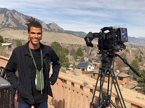 Black student Zayd Atkinson was picking up trash outside his dormitory when a white police officer in Boulder, Colorado, detained him in March, 2019. (Photo | AP)