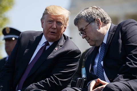 President Donald Trump talks with Attorney General William Barr during the 38th Annual National Peace Officers' Memorial Service at the US Capitol. (Photo | AP)