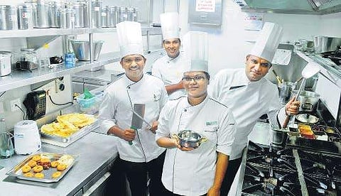 (From left) Sous chef Deepu Mohan, chef Shyam Gopi, chef de parte Manjusha, and executive chef Saurabh Singh Photo | A Sanesh