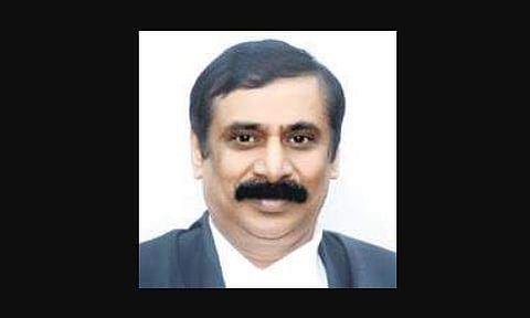 Justice Huluvadi G Ramesh
