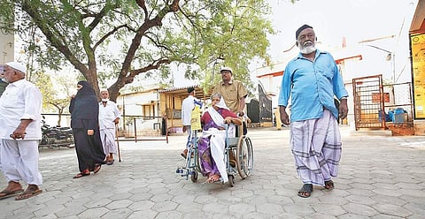 An 80-year-old woman arrives at the polling station at Pallapatti in Aravakurichi on Sunday | S Aravind Raj