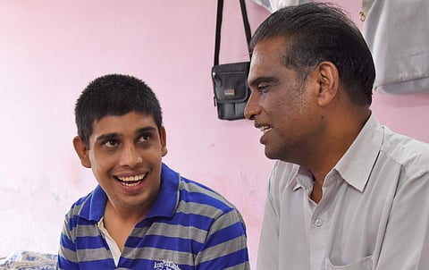 Akhil K P, in conversation with his father P Vijayan at E K Nayannar Charitable trust where he is residing as part of his treatment at Sree Chithra Hospital. (Photo |B P Deepu, EPS)