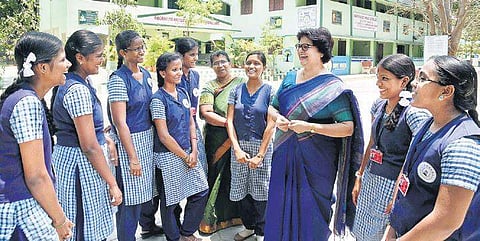 Headmistress Shashi Swaran Singh interacting with students at Jaigopal Garodia Government Girls Higher Secondary School (Photo| R Satish Babu/EPS)