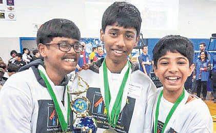 The three  students from Hyderabad  who secured second and third positions in the International Robofest held in Michgan  | Express