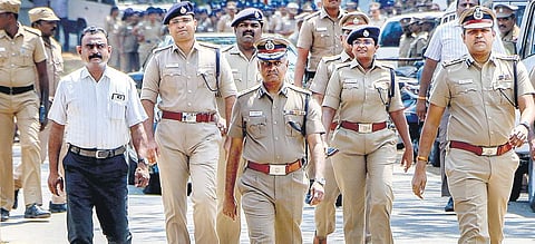 Police officers monitoring CCTV footage at Government College of Technology, a vote counting centre, in Coimbatore on Wednesday