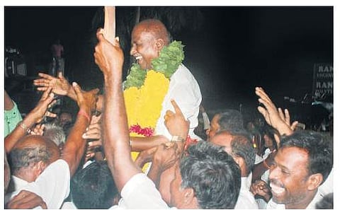 AIADMK candidate G Sampathu with supporters after winning Sholingur Assembly constituency on Thursday (Photo| EPS)