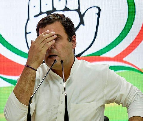 Congress President Rahul Gandhi reacts as he addresses a press conference on 2019 Lok Sabha polls results at the party headquarters in New Delhi Thursday May 23 2019. | PTI