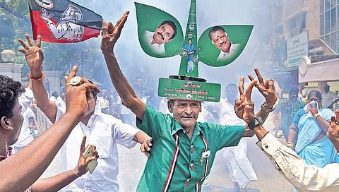 Elated supporters of AIADMK celebrate the party’s bypoll results in Chennai on Thursday | R Satish Babu