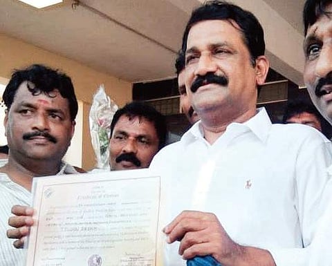 TDP nominee Ganta Srinivasa Rao shows the election certificate at a press conference in Visakhapatnam on Friday | EXPRESS