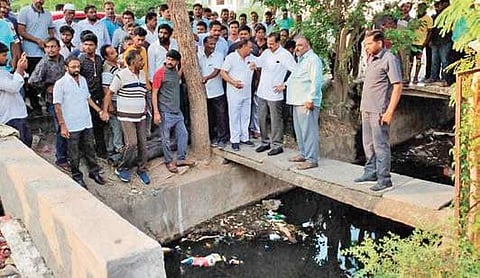 MLA Gopireddy Srinivasa Reddy inspecting drains in Narasaraopet municipality on Saturday | Express