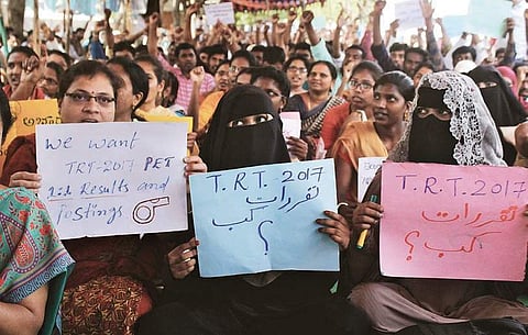 USPC members stage a dharna at Dharna Chowk, demanding the appointment of teachers selected through TRT | sathya keerthi