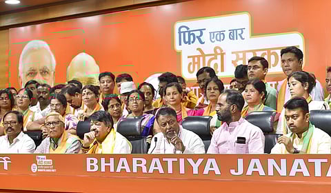 BJP leaders Kailash Vijaivargiya and Mukul Roy with two Trinamool Congress and one CPM legislator, who joined Bharatiya Janata Party along with 60 councillors from three civic bodies in West Bengal, in New Delhi, Tuesday, May 28, 2019. (Photo | PTI)