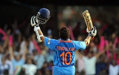 Sachin Tendulkar celebrates his century during World Cup match against England at Chinnaswamy Stadium in Bengaluru (File Photo | AFP)
