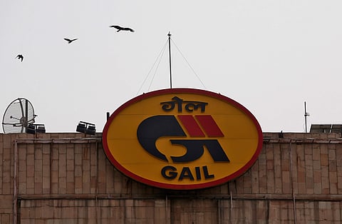 Birds fly past the logo of India's state-owned natural gas utility GAIL (India) Ltd in New Delhi 