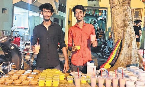 Firni and shahi tukda are big hits at the stall run by Rahman (right) and Farman