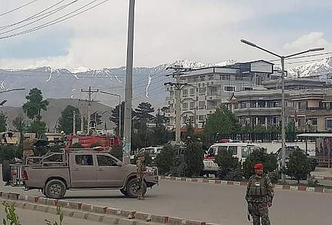 Afghan security personnel arrive near a site of an attack near the Marshal Fahim Military Academy base in Kabul ( Photo | AFP)